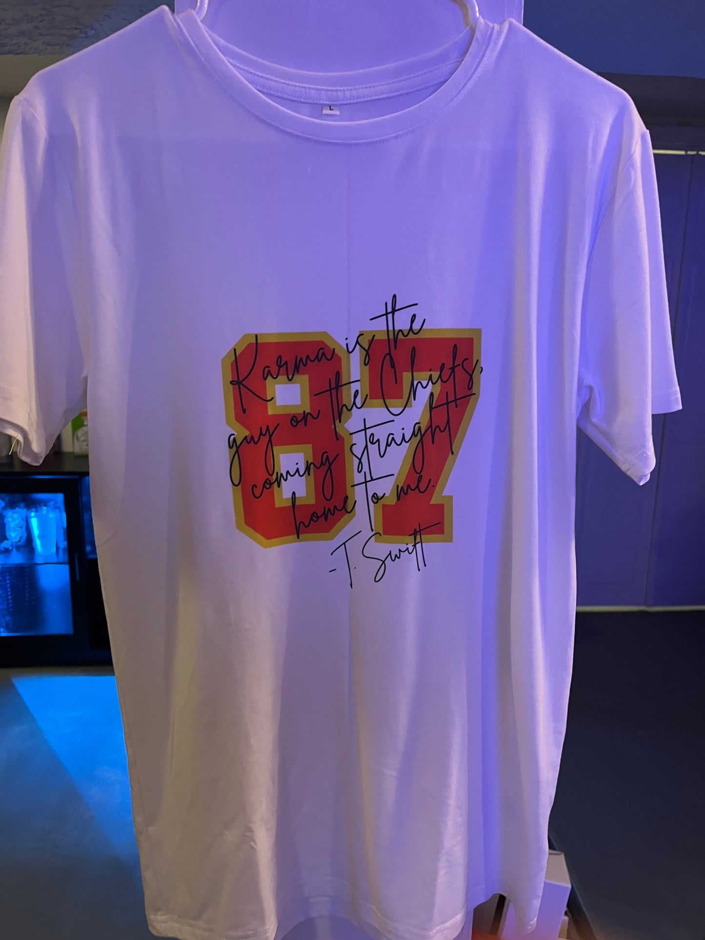 Large karma is a guy on the Chiefs shirt 